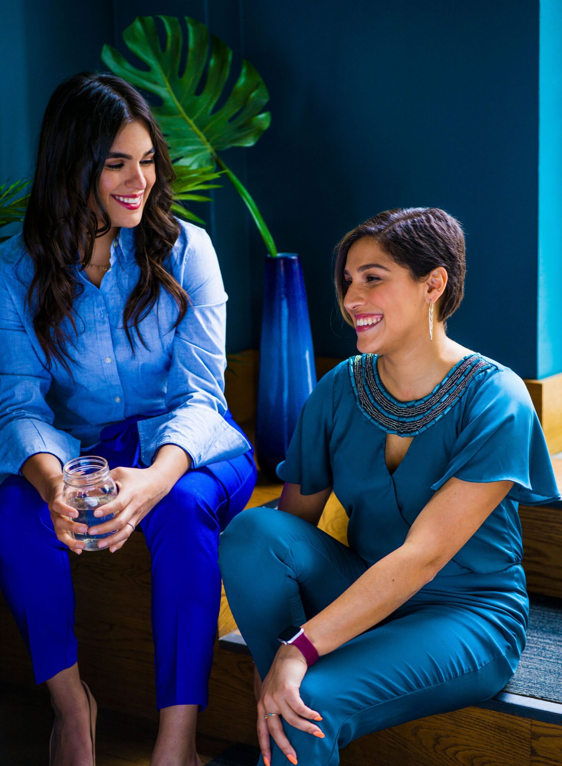 Two women talking and smiling